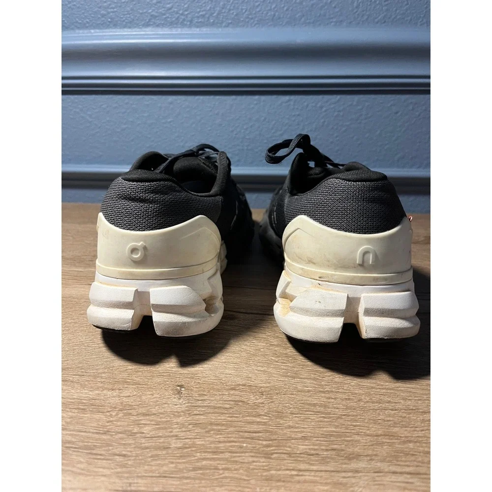 On Cloudnovel Women's Black and Cream Athletic Shoes